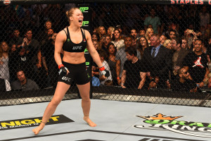 Rousey celebrating her fastest win in UFC History against Cat Zingano.