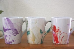 multicolored watercolor mugs